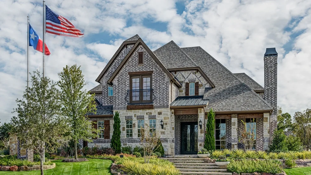 Real exterior of the Newport Homebuilders Lantana Bellaire model home, historic builder gallery