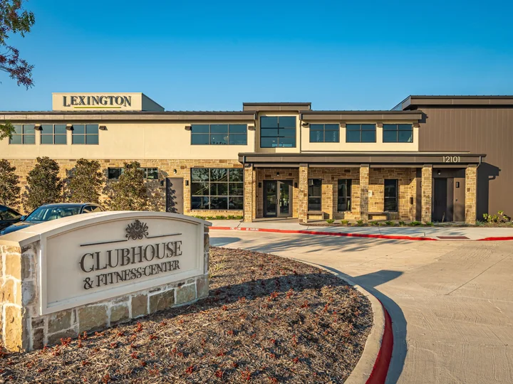 Lexington clubhouse and fitness center exterior with visible Lexington sign, at 12101 Charismatic Parkway
