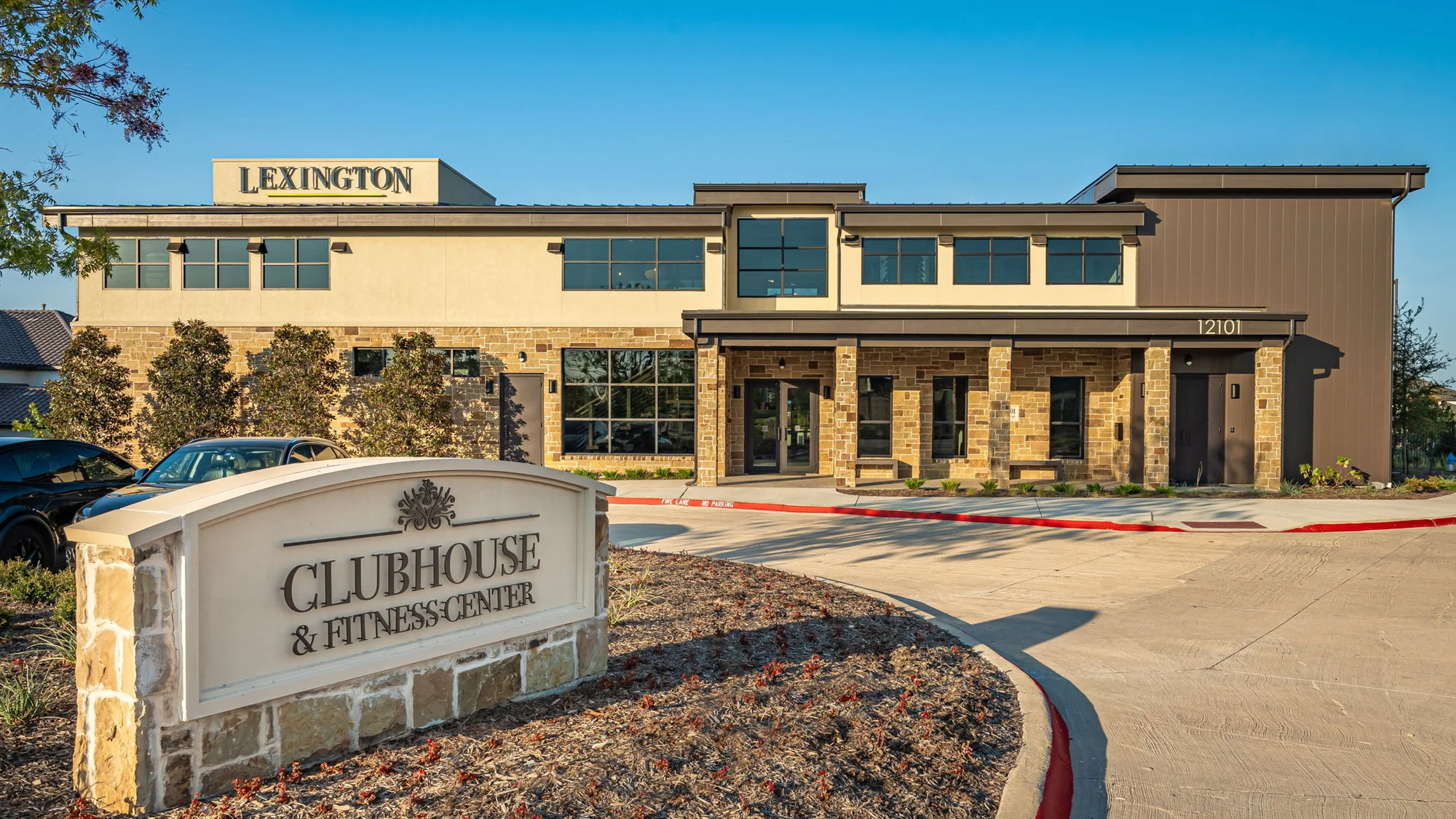 Lexington clubhouse and fitness center exterior with visible Lexington sign, at 12101 Charismatic Parkway