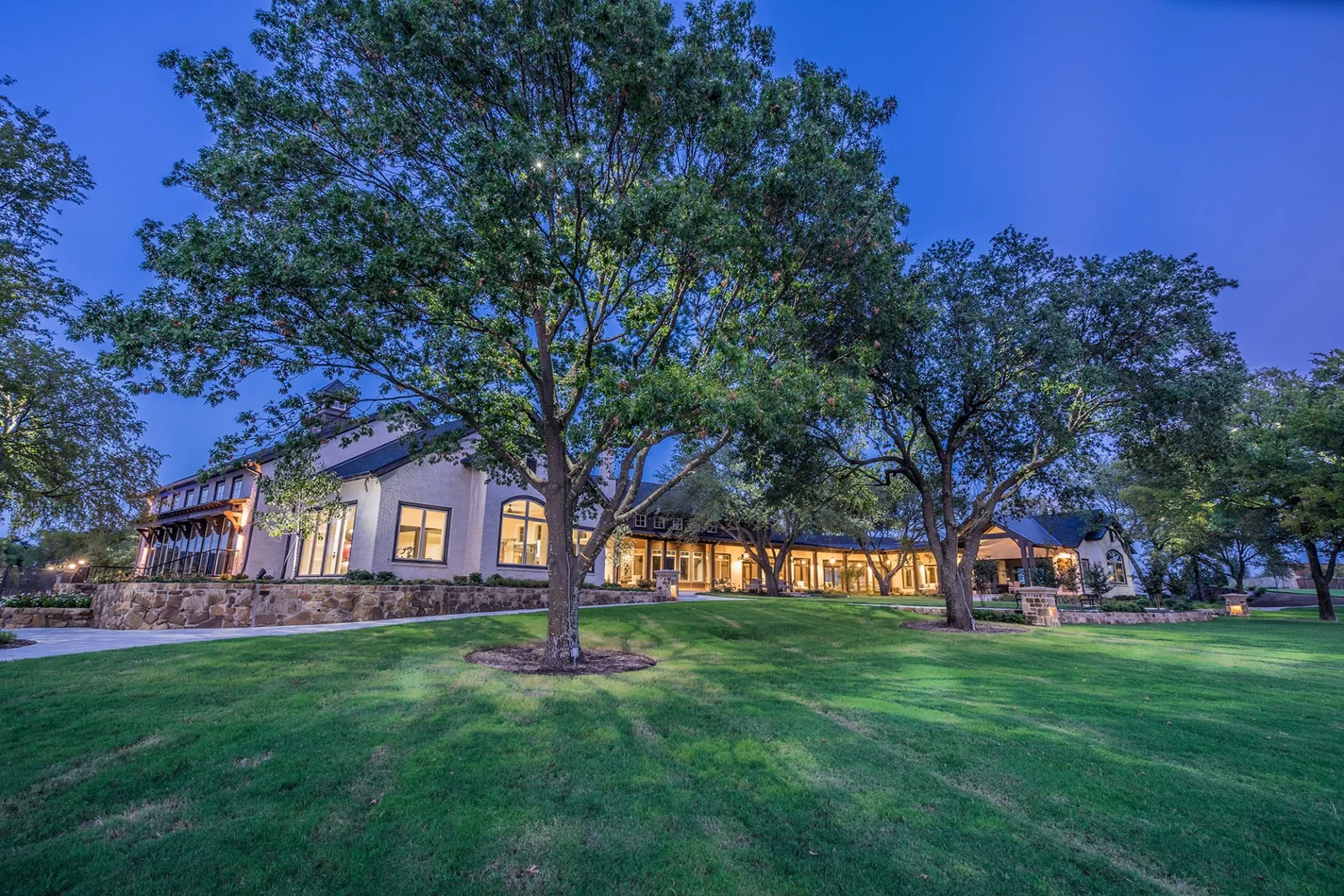 The Club at Mustang Lakes at dusk, official gallery photograph