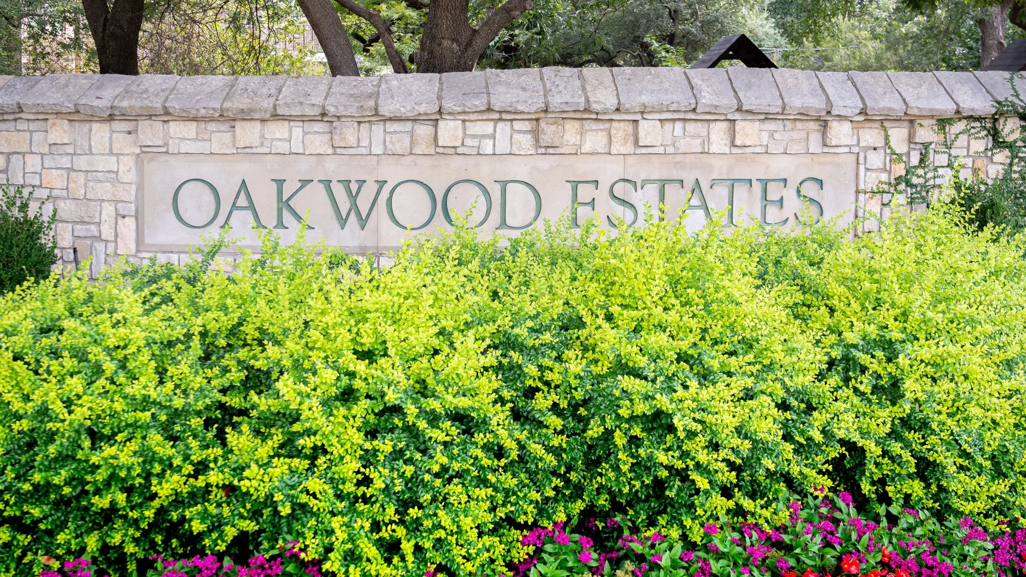 Named Oakwood Estates entry monument and landscaping