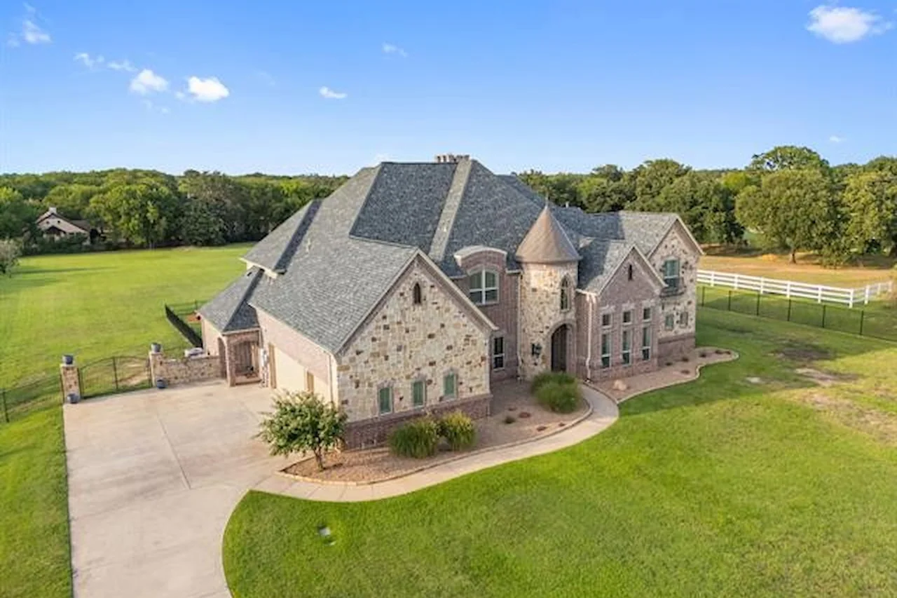 Aerial exterior of 1311 Appaloosa Circle, a different named Saddlebrook Estates residence in Bartonville
