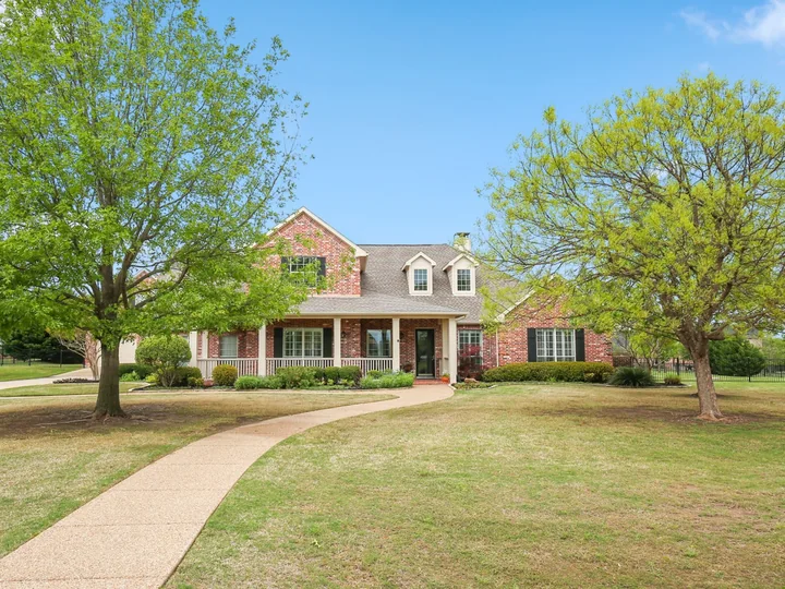 1521 Briardale Drive front exterior, an exact Saddlebrook Estates residence