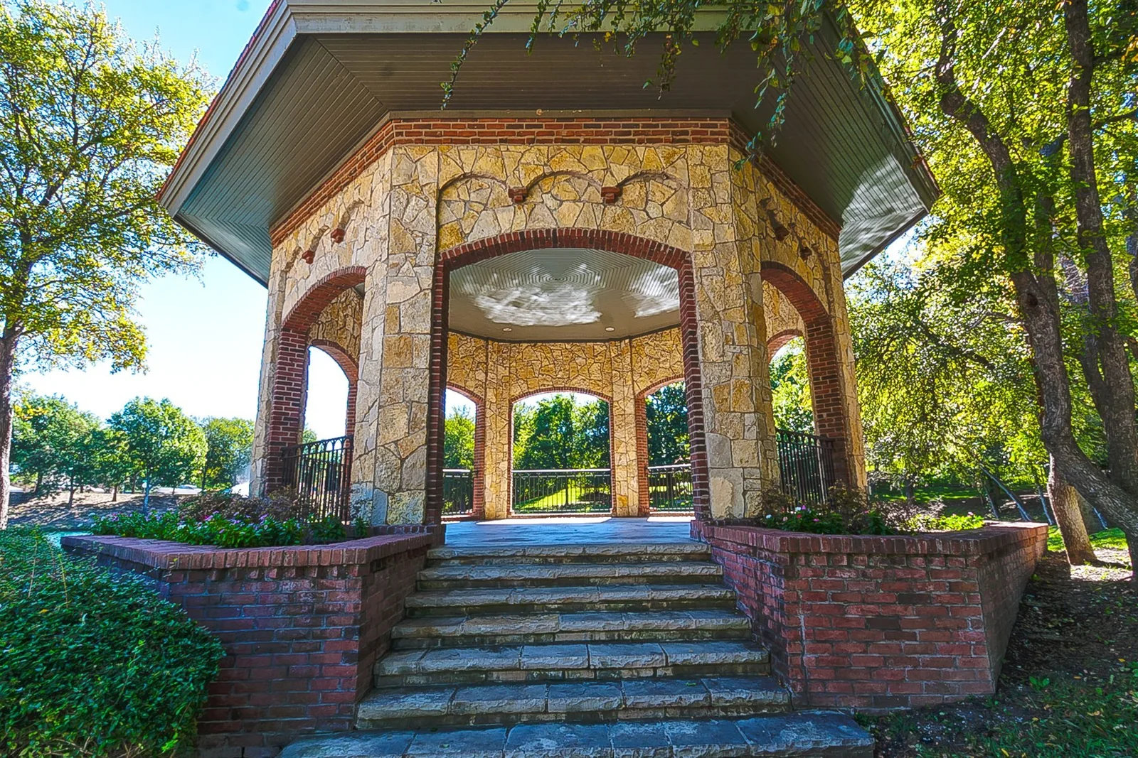 Stone gazebo beside Shoal Creek greenspace