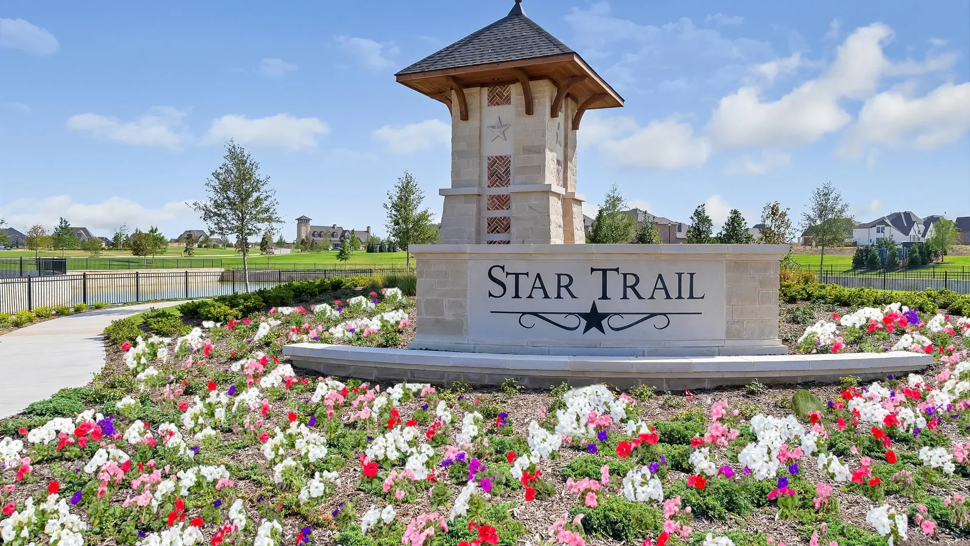 Star Trail entrance monument and flowers