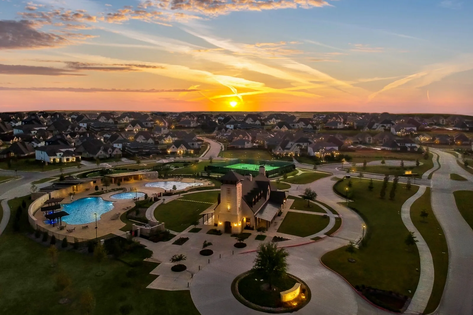 Star Trail community center and surrounding homes at sunset, official developer gallery photograph
