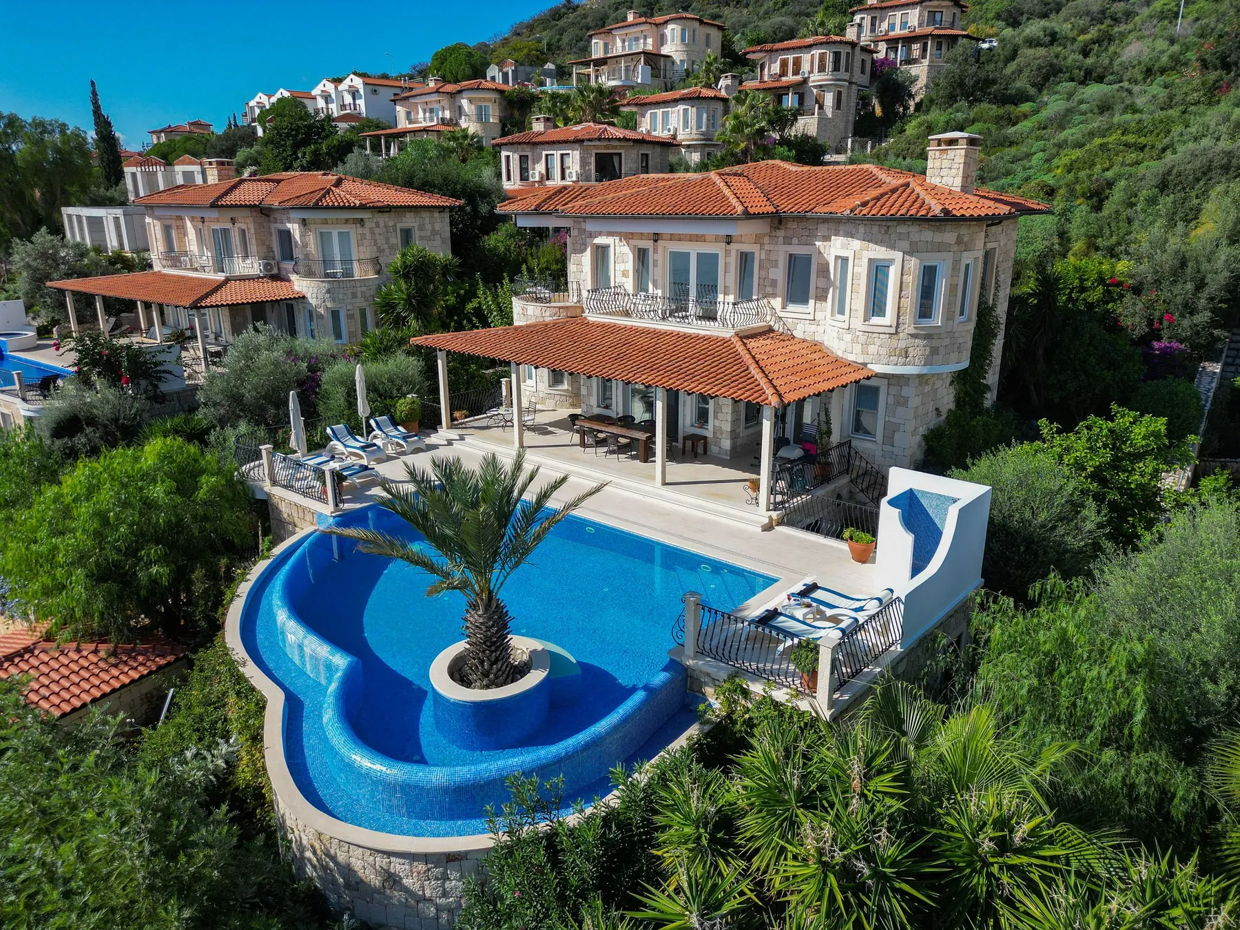 Mediterranean-style residence with landscaped pool
